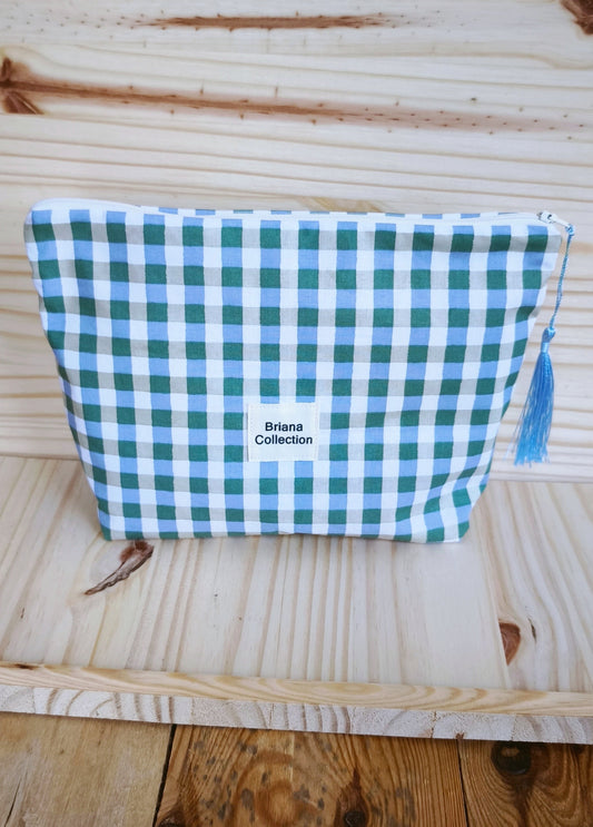 Pochette à carreau tendance coloris vintage avec fermeture zip et petit pompons 