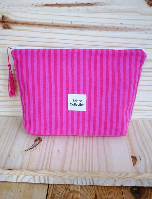 Pochette trapèze à rayures rose vif et fermeture zip
